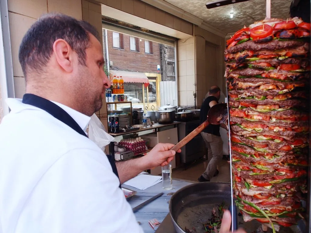 Doner kebab plate served with fresh vegetables Istanbul
