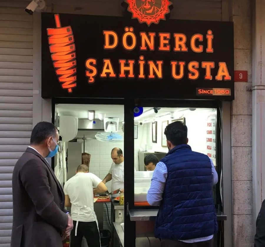 Doner kebab served inside fresh-baked pide flatbread at Donerci Sahin Usta in the Grand Bazaar Istanbul
