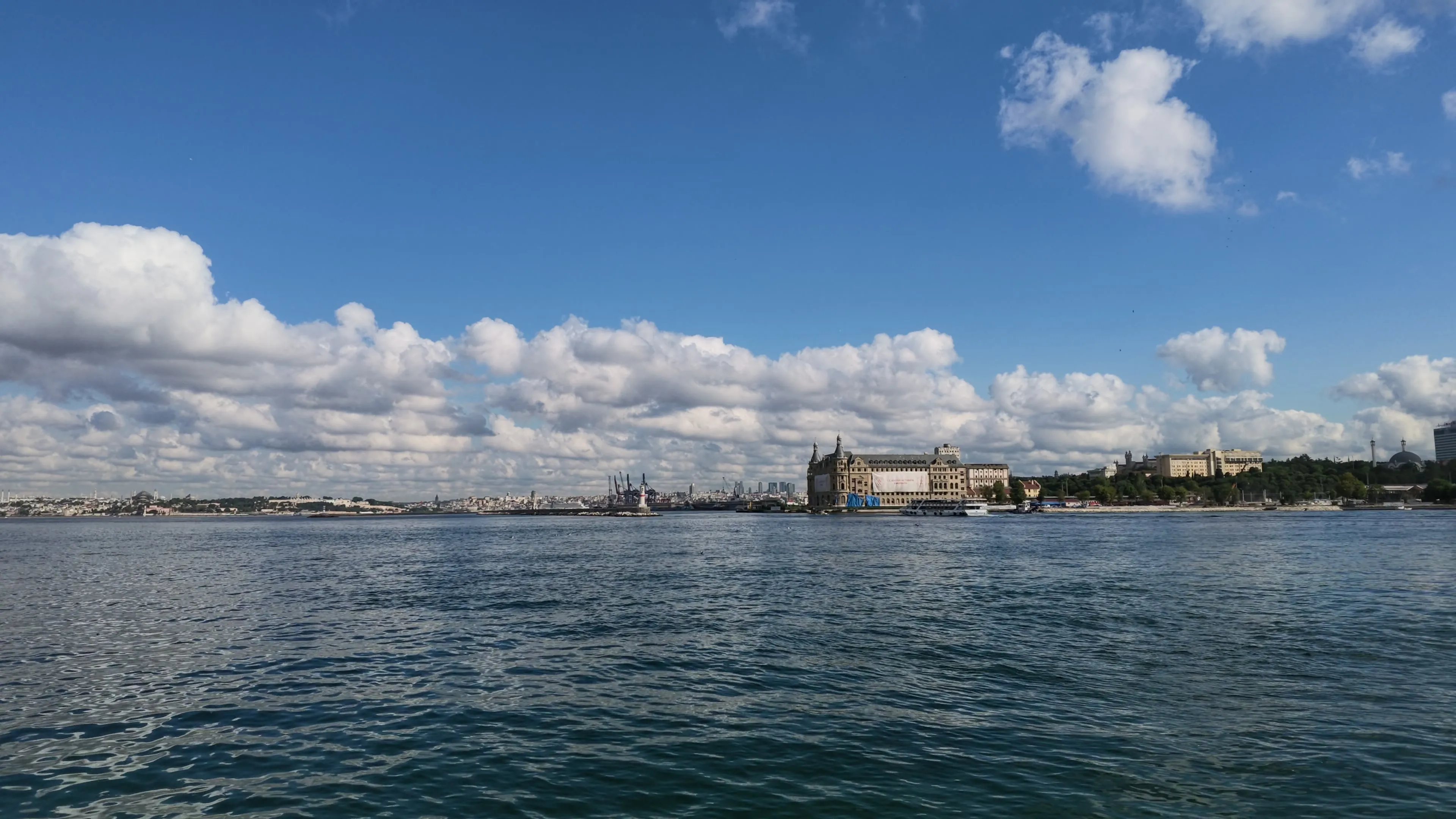 Kadıköy waterfront, Haydarpaşa station, and a passenger ferry on the Bosphorus