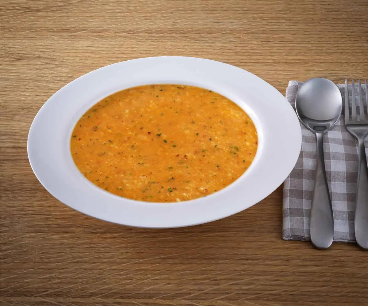 Ezogelin soup served in a soup bowl