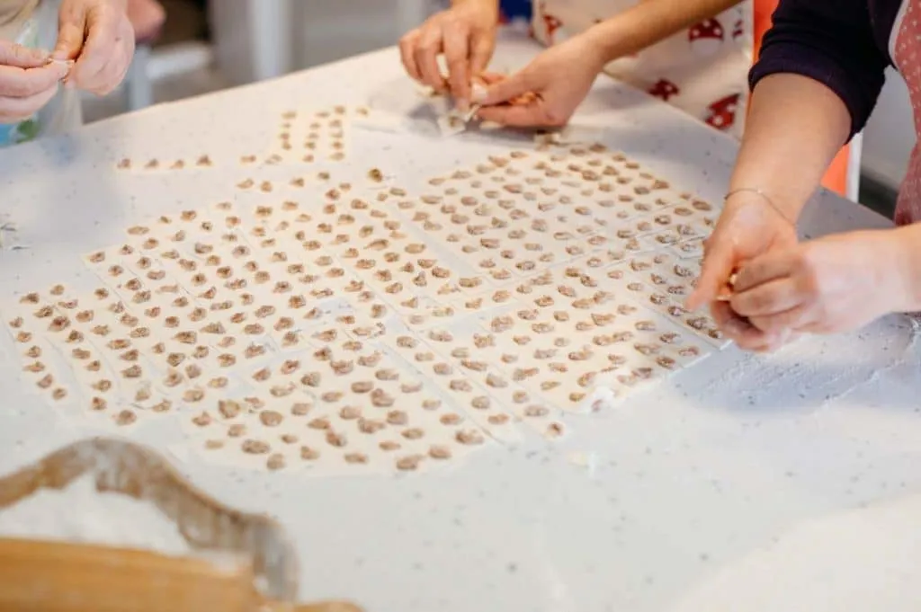 Making Turkish mantı: small dumplings prepared by hand