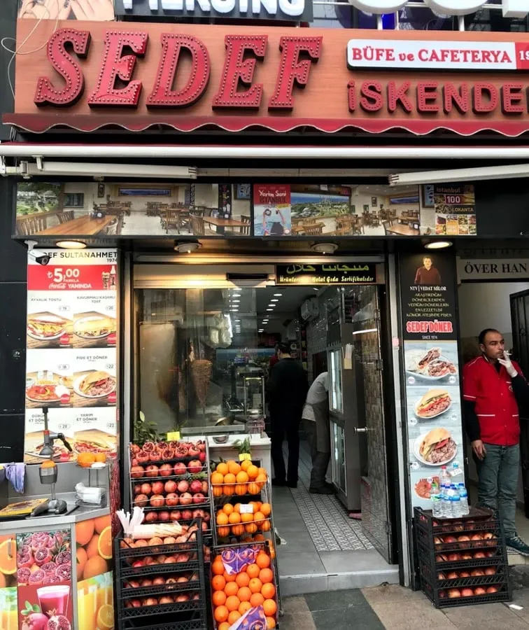 Doner kebab plate with chips and fresh vegetables at Sedef Bufe in Sultanahmet Istanbul