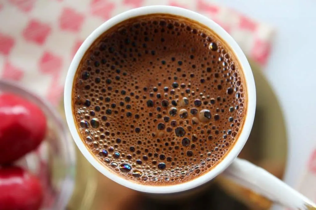 Foamy Turkish coffee in a small cup